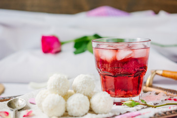 Breakfast in bed - candy and juice with ice.