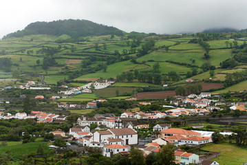 Fototapeta na wymiar Azores green volcanic island Portugal landscape village houses
