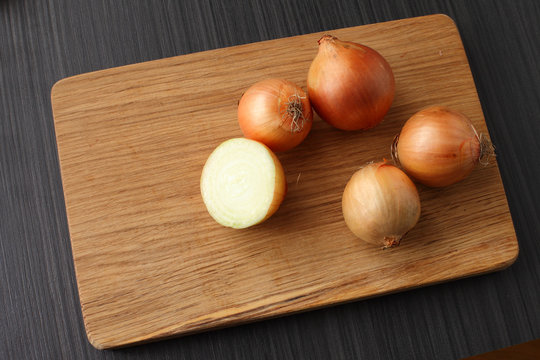 bulbs on a blackboard/ Onions on a cutting board oak