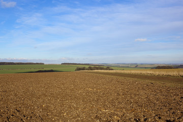 Fototapeta na wymiar plow soil in a winter landscape