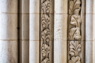 restored old limestone pillars or columns with carving for craftsmanship