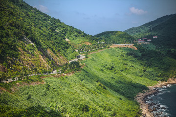 Long road in Vietnam next to the shore.