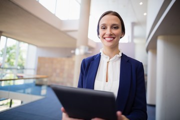 Fototapeta premium Businesswoman holding digital tablet