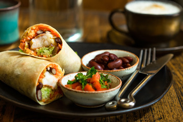 High Angle Still Life of Trio of Tex Mex Fajita Wraps Wrapped in