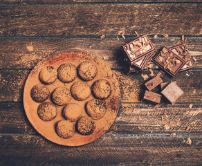 Chocolate background. Broken slices of chocolate, fruit chocolate