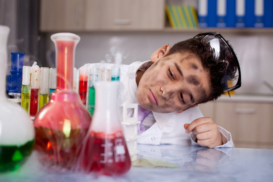 scientist boy working in a laboratory