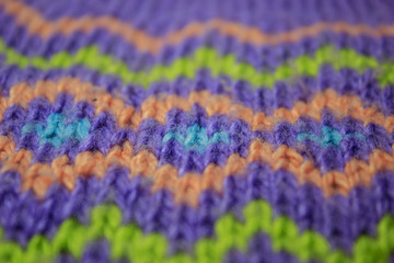 Fototapeta na wymiar Multicolored knitted pattern