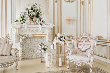 Luxurious vintage interior with fireplace in the aristocratic style