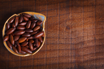 Baru almond on wooden background