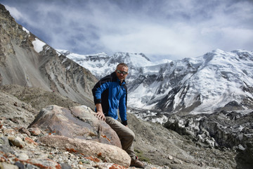Man on a background of mountains