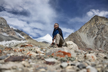 Fototapeta premium Man on a background of mountains