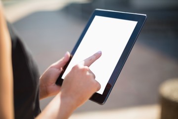 Businesswoman using digital tablet