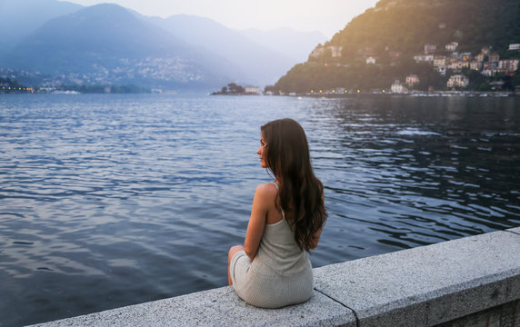 Young Woman At The Lake Como At Sunset