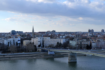 Obraz premium Photographed moment busy city of Novi Sad during a sunny winter day in December. With views from the Petrovaradin fortress, Serbia
