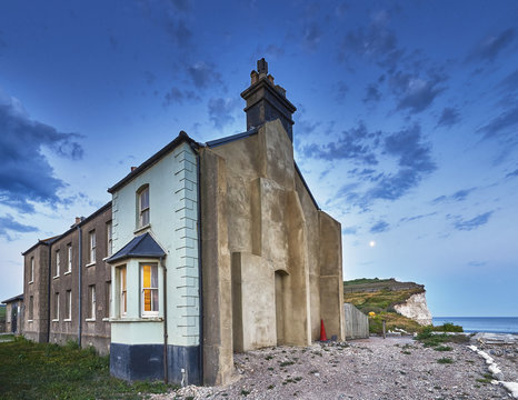 Cottages at Birling Gap, Sussex in the evening