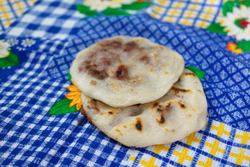 Pupusas from El Salvador, from bean to cheese on a typical Salvadoran blanket. - 136231967