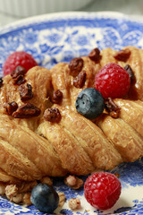 Braided danish bun made of puff pastry.