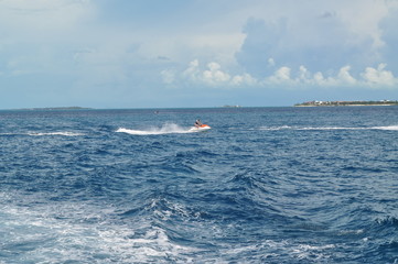 Obraz premium Wake jumping a wave runner