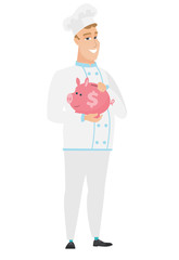 Caucasian chef cook holding a piggy bank.