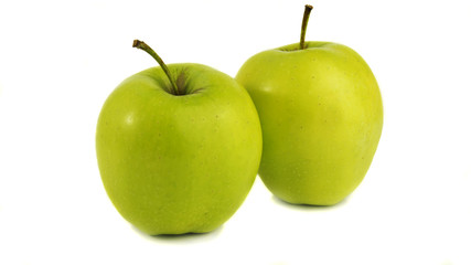 Two green apples on a pure white background