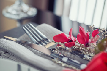 Table place setting with holidays decoration.