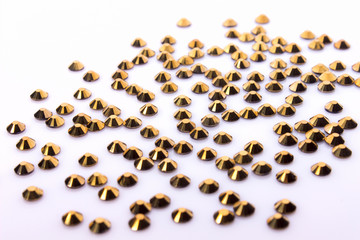 Gold Rhinestones on White Background Acrylic.