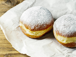 Home made doughnuts sprinkled with powdered sugar