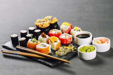 Japanese sushi set on a black background