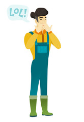 Young asian farmer laughing out loud.