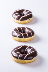 Set of stripped chocolate donuts