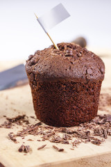 Chocolate muffin sprinkled with chocolate chips