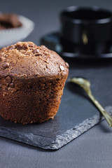 chocolate muffin and a cup of coffee