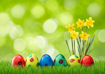 Spotted easter eggs with green bokeh background