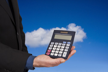 closeup of the calculator in hand, concept of finance and economics