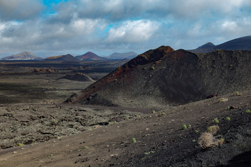 Wide view of Volcanic Landscape Big Mountains and Blue Sky