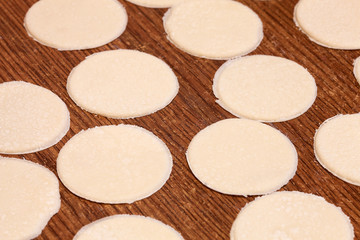 The dough rolled with circles.