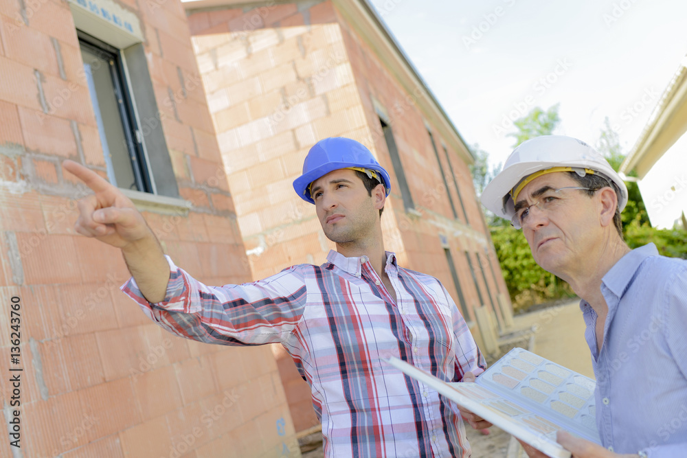 Wall mural two architects working on site