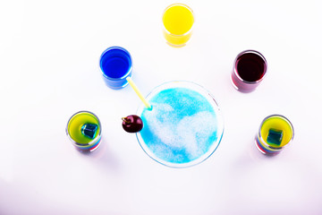 Mixed alcoholic drinks; colored shots