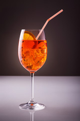 Glass of orange light alcoholic drink