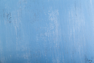 Obraz premium Blue wood background. Painted scraped wooden board. Grunge plywood texture or pattern.