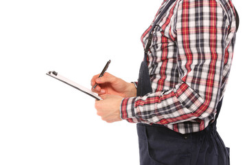 young worker man writing on clipboard , side view, white background