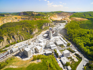 Biggest Czech limestone quarry Certovy Schody. Significant source of air pollution. Aerial view of industrial landscape after mining. Industry and environment in Czech Republic, Europe.