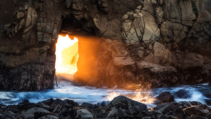 Winter Solstice Light Beam Through a Sea Cave Tunnel on Pfeiffer Beach