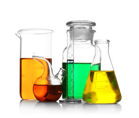Laboratory glassware with samples on white background