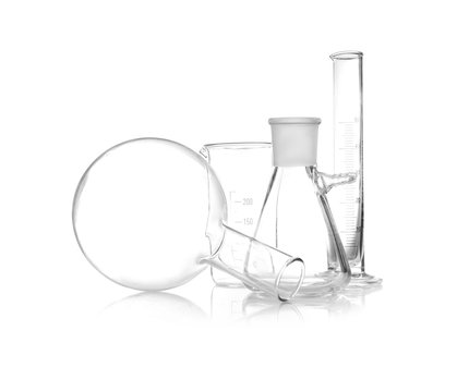 Clean laboratory glassware on white background