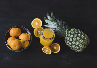 Organic oranges and pineapple assortment