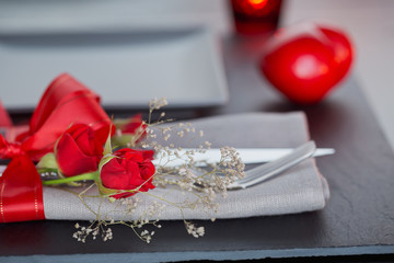 Table place setting with holidays decoration.