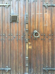 Wooden door and classic doorknocker background