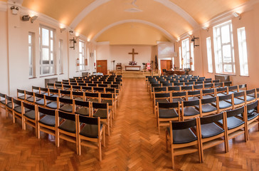 Empty chairs in the church