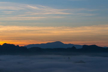 Fototapeta na wymiar mountains in morning clounds in Mae Hong Son 09